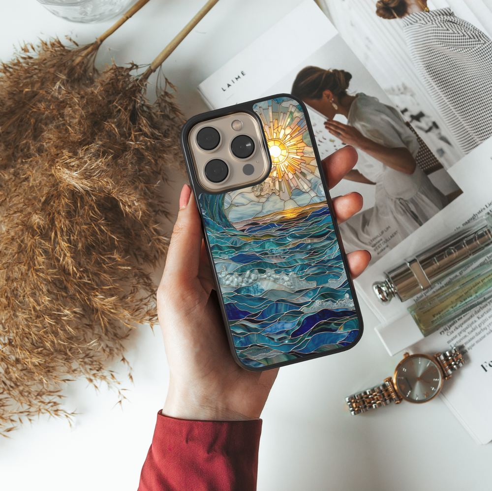 Artistic stained glass ocean wave and sun phone case with coastal blue tones and glowing sunlight – fits iPhone and Samsung