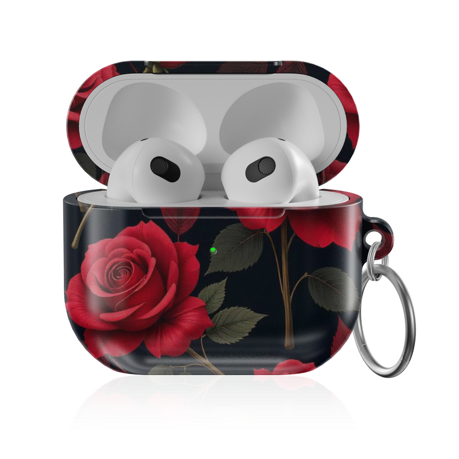 Glossy AirPods case with deep red rose floral design on a black background, featuring a silver keychain—romantic and elegant accessory for music lovers.