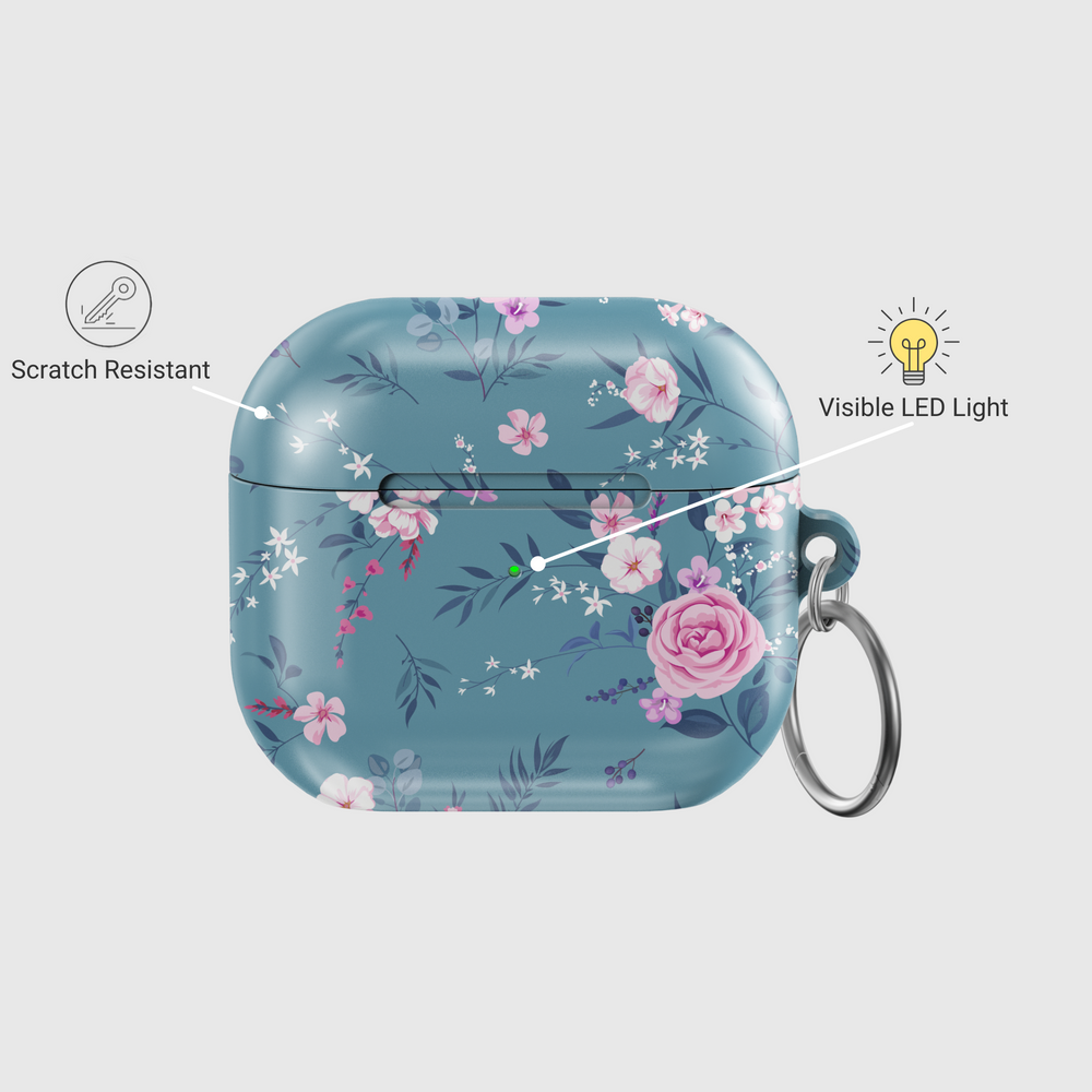 Glossy teal AirPods case with elegant pink and white floral design, featuring a secure keychain ring. A chic and music-inspired protective cover for AirPods Pro and AirPods 3.