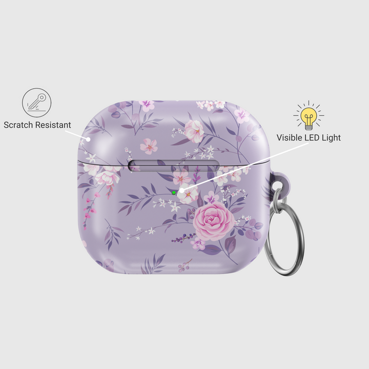 Elegant purple AirPods case with a soft pink and white floral pattern, featuring a silver keychain ring. Music-inspired aesthetic perfect for feminine, romantic styles. Fits AirPods Pro and AirPods 3.