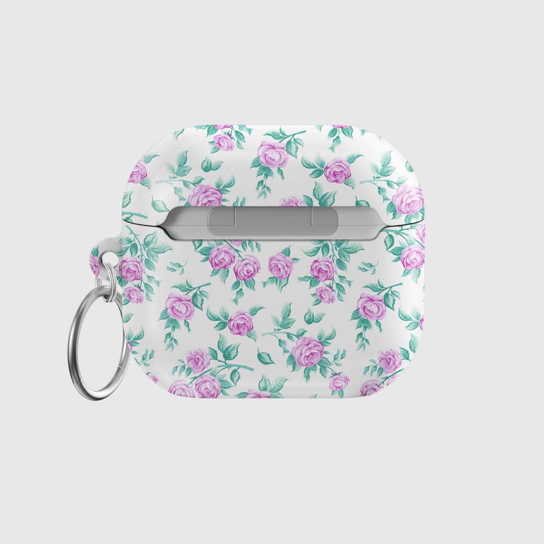 White AirPods case cover with pink vintage rose pattern and green leaves, featuring a silver keychain ring. Music-inspired floral design perfect for a romantic aesthetic, compatible with AirPods Pro and AirPods 3.
