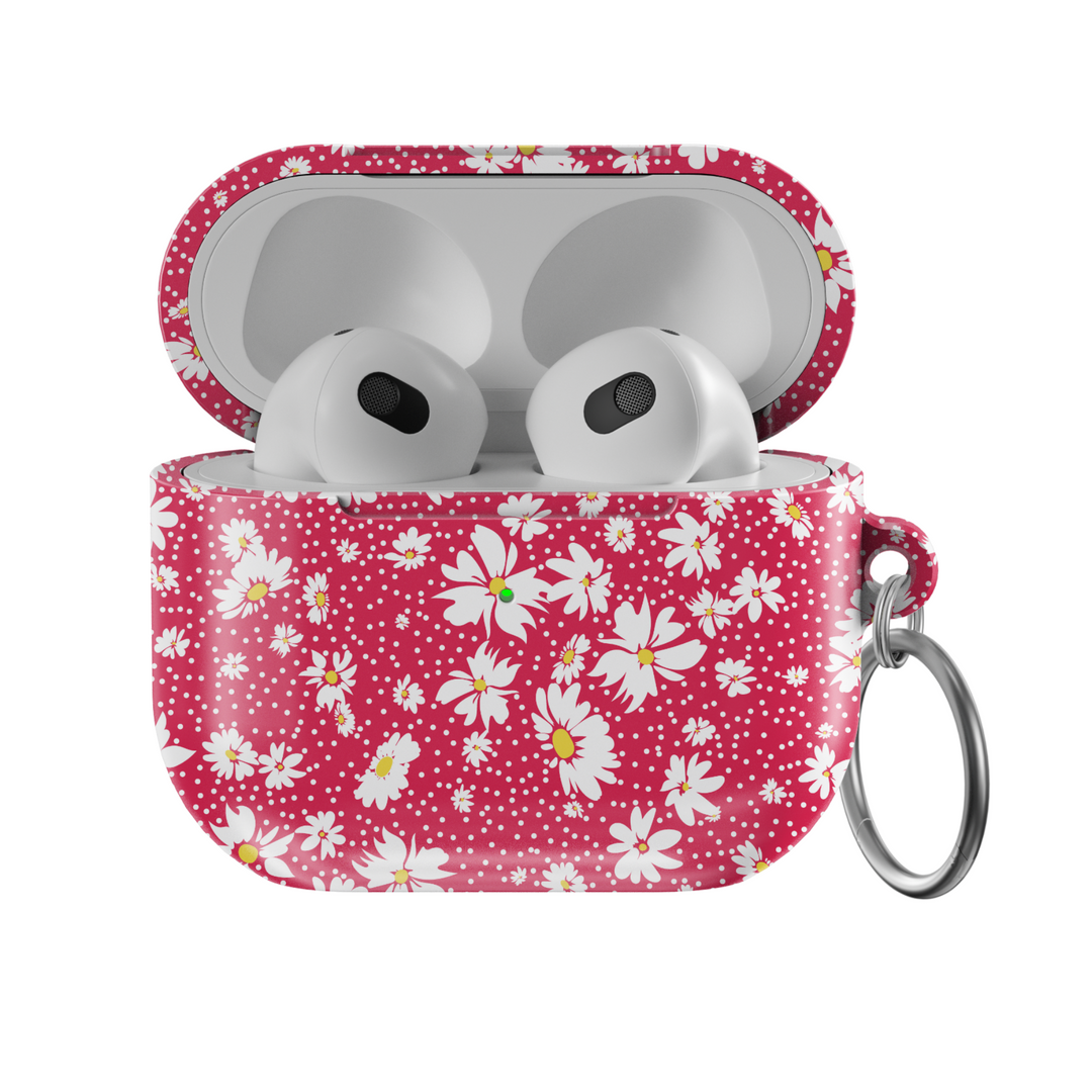 Red AirPods case with white daisy flower pattern and silver keyring, cute floral protective cover for AirPods Pro, retro spring-style accessory.