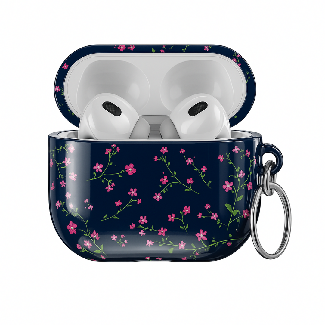 Navy blue AirPods case with pink floral design and silver keyring, cute botanical protective cover for AirPods Pro or AirPods 3.