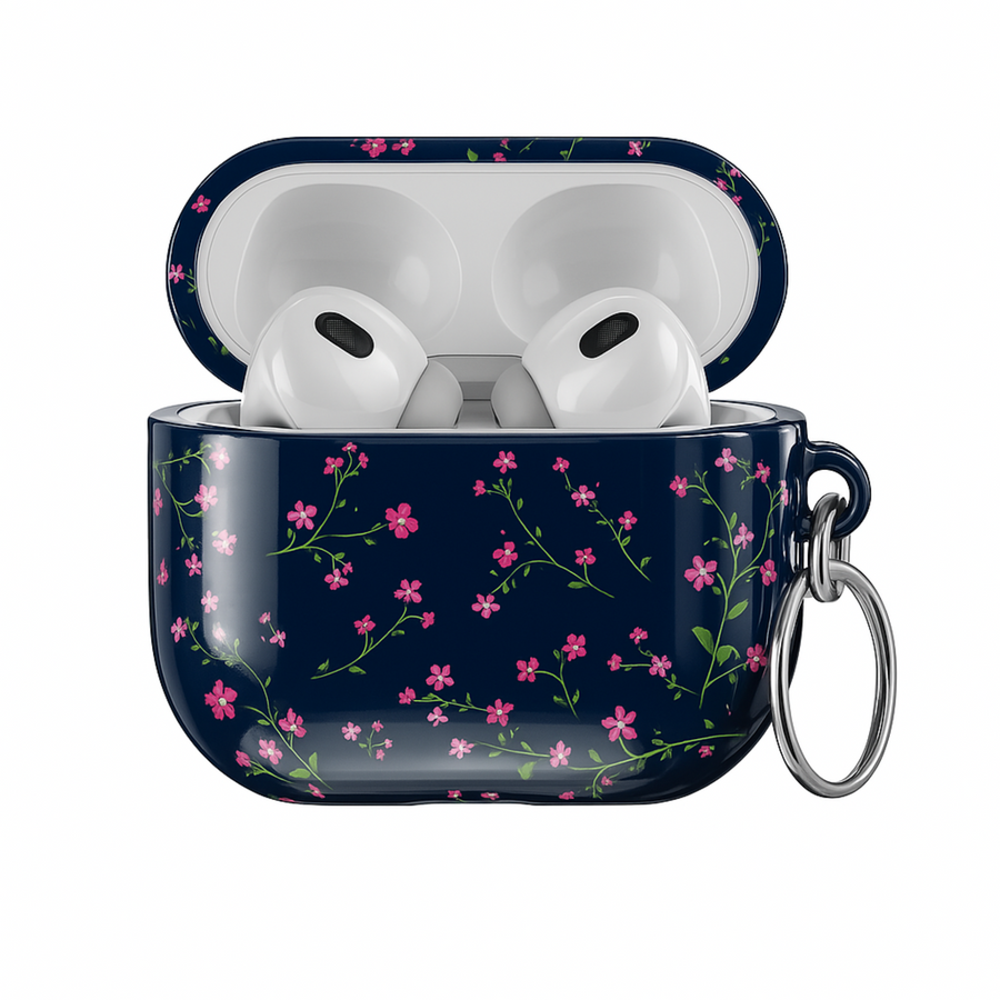 Navy blue AirPods case with pink floral design and silver keyring, cute botanical protective cover for AirPods Pro or AirPods 3.