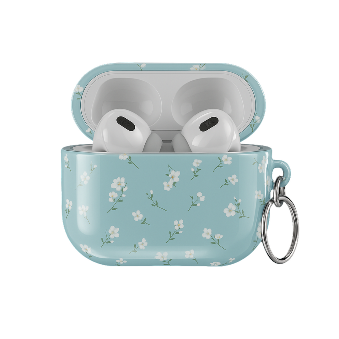 Light blue AirPods case with delicate white floral design and silver keyring, soft minimal aesthetic protective cover for AirPods Pro or AirPods 3.