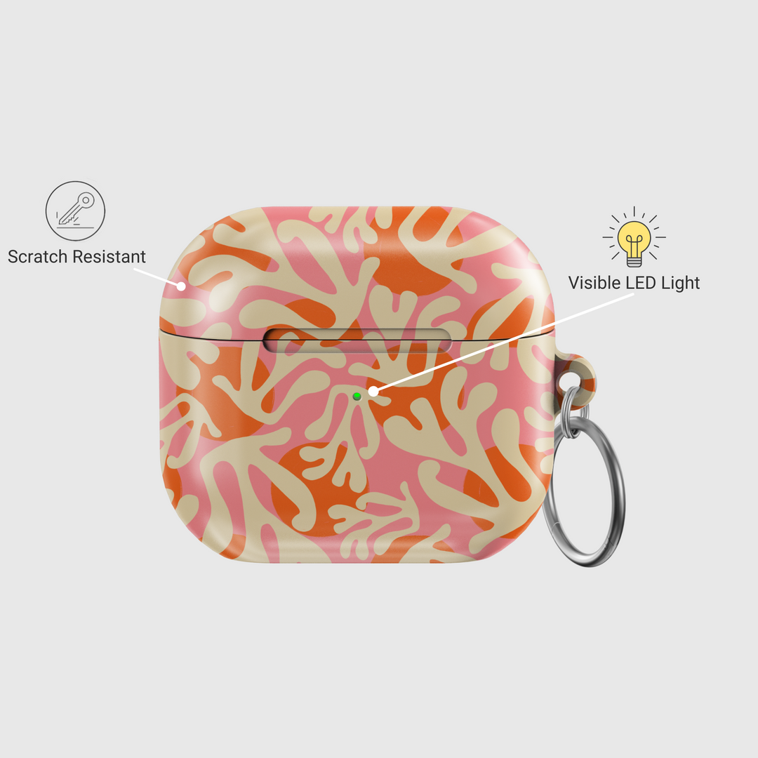 Tropical coral reef patterned AirPods case in peach, pink, and orange tones with keychain clip – compatible with AirPods 3rd Gen.