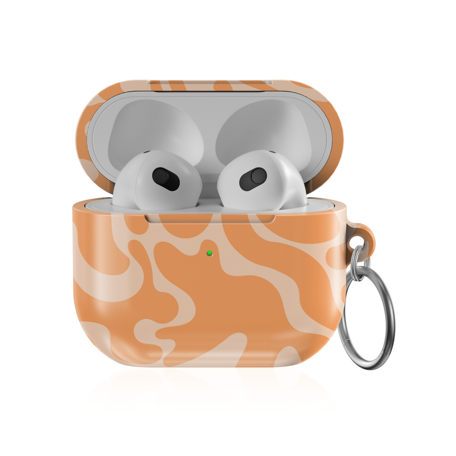 Glossy AirPods case with peach orange abstract swirl pattern and keychain ring