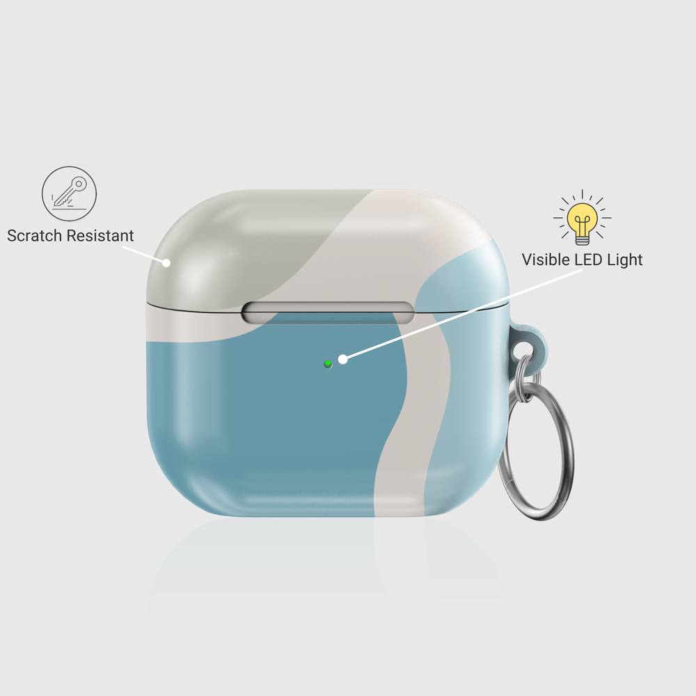 Glossy pastel blue AirPods case with beige wavy abstract print and silver keychain