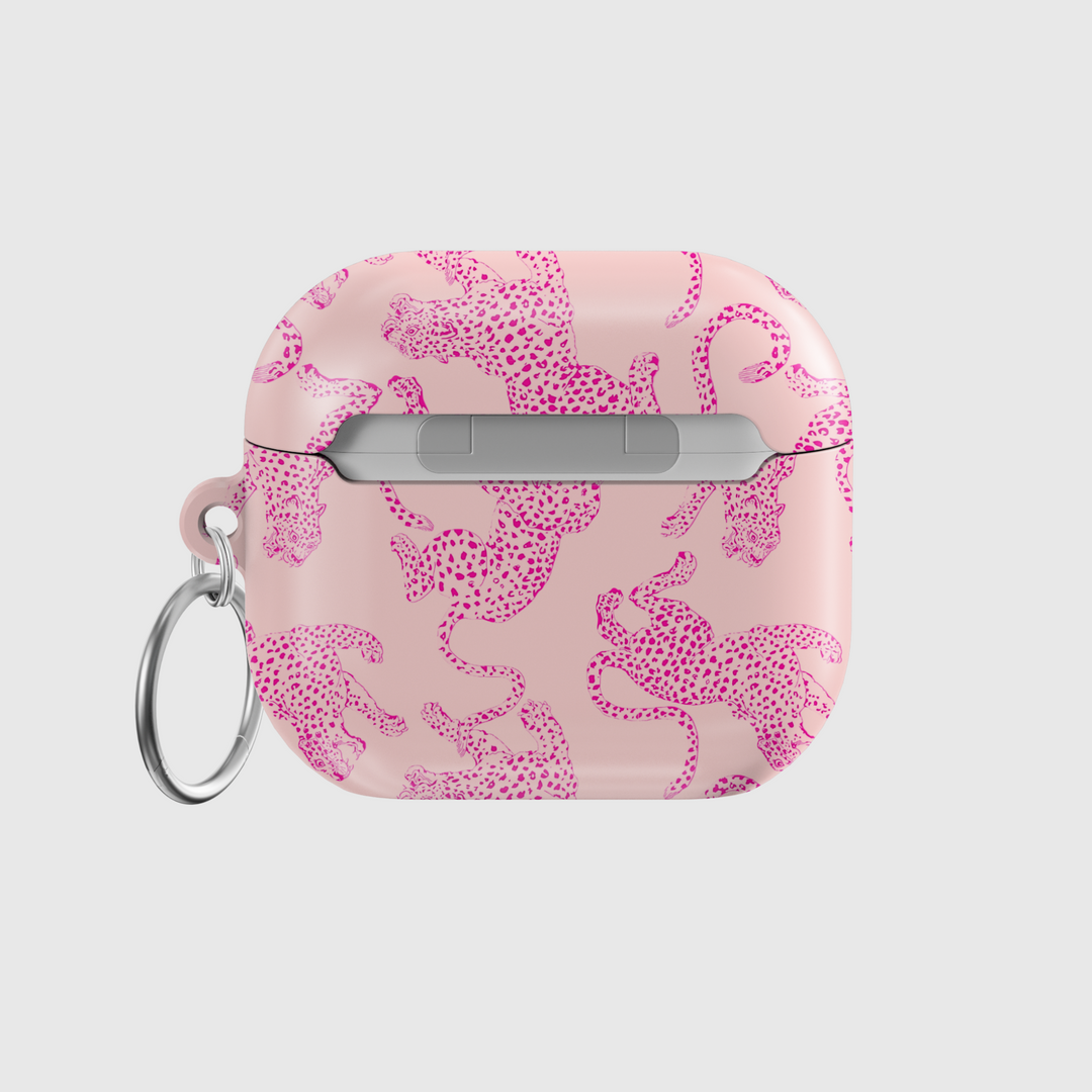 Light pink glossy AirPods case with pink leopard print design and a silver keyring attachment, stylish and playful for everyday use.