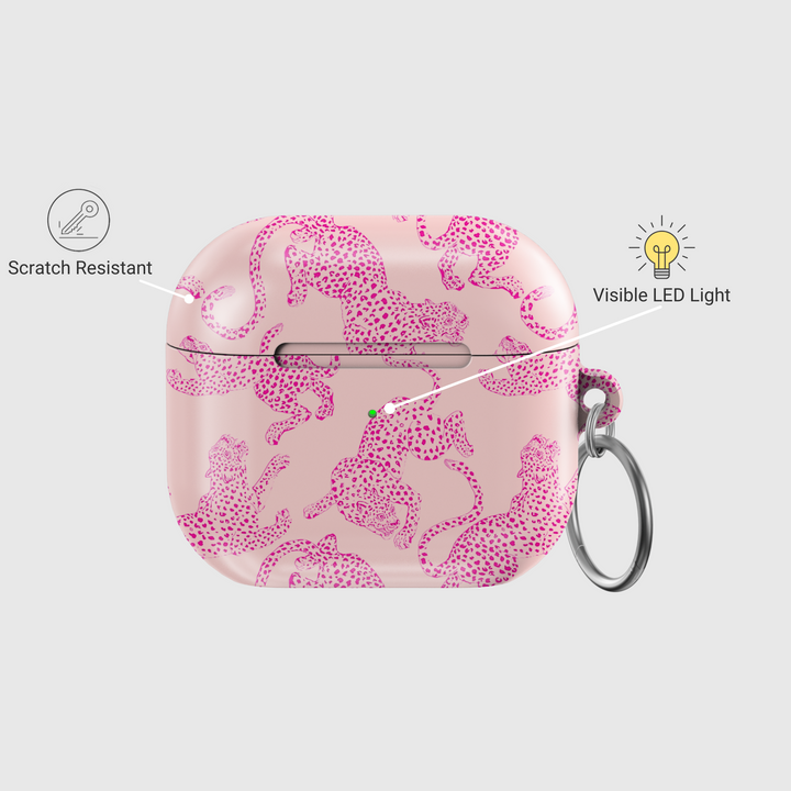 Light pink glossy AirPods case with pink leopard print design and a silver keyring attachment, stylish and playful for everyday use.