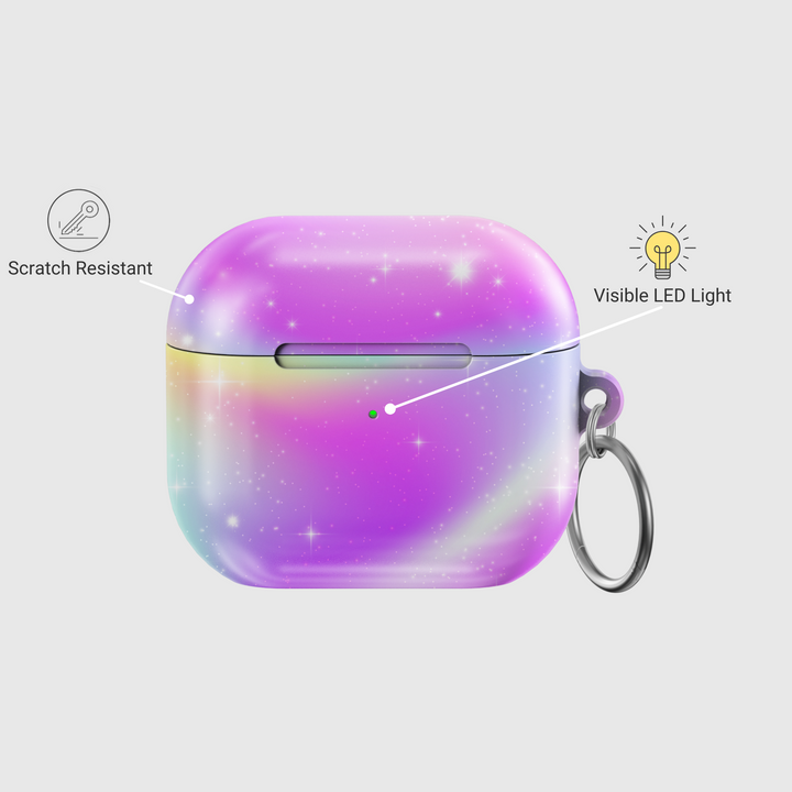 AirPods case featuring a pastel ombre galaxy design with sparkling stars, blending soft purple, pink, blue, and yellow tones, finished with a keychain ring.