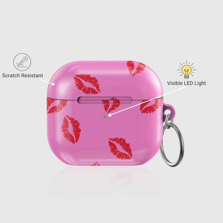 Glossy pink AirPods case with red lipstick kiss prints and keychain ring – cute girly style