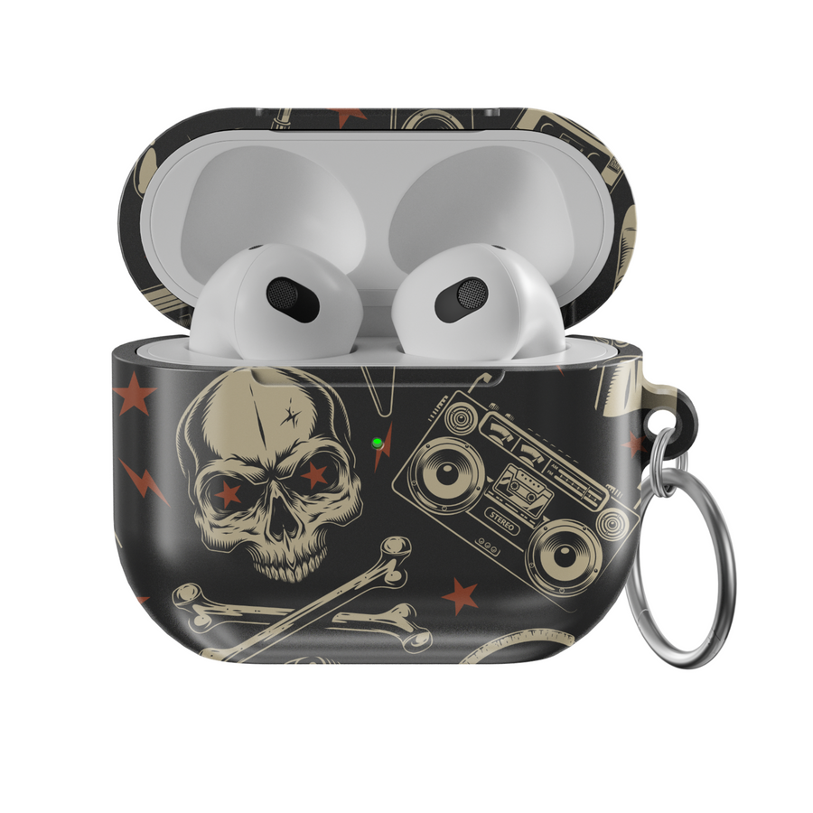 Black AirPods case featuring skull and bones design with retro boombox and red stars, edgy punk rock aesthetic with glossy finish and metal keychain ring.