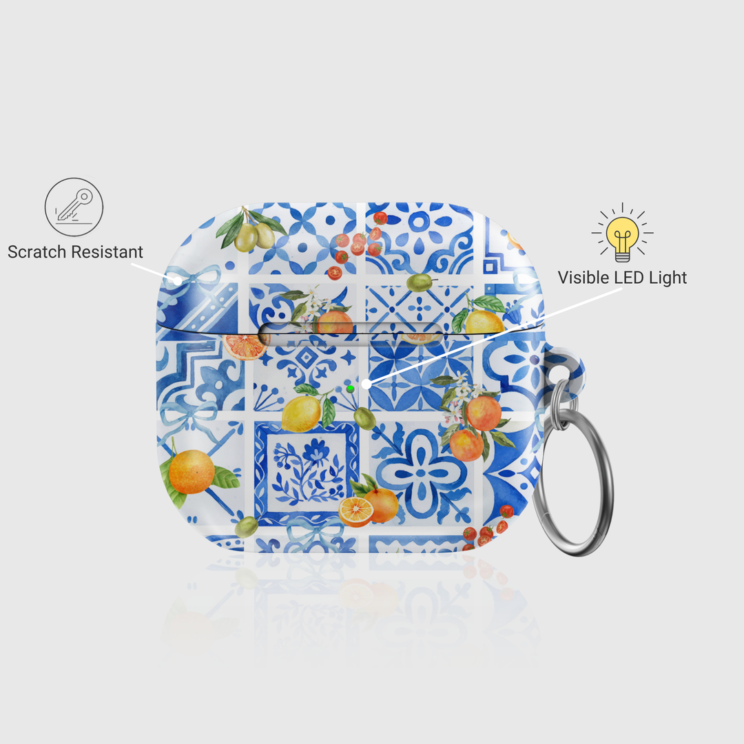 AirPods case with blue tile Mediterranean print and citrus fruit design, silver keychain ring attached