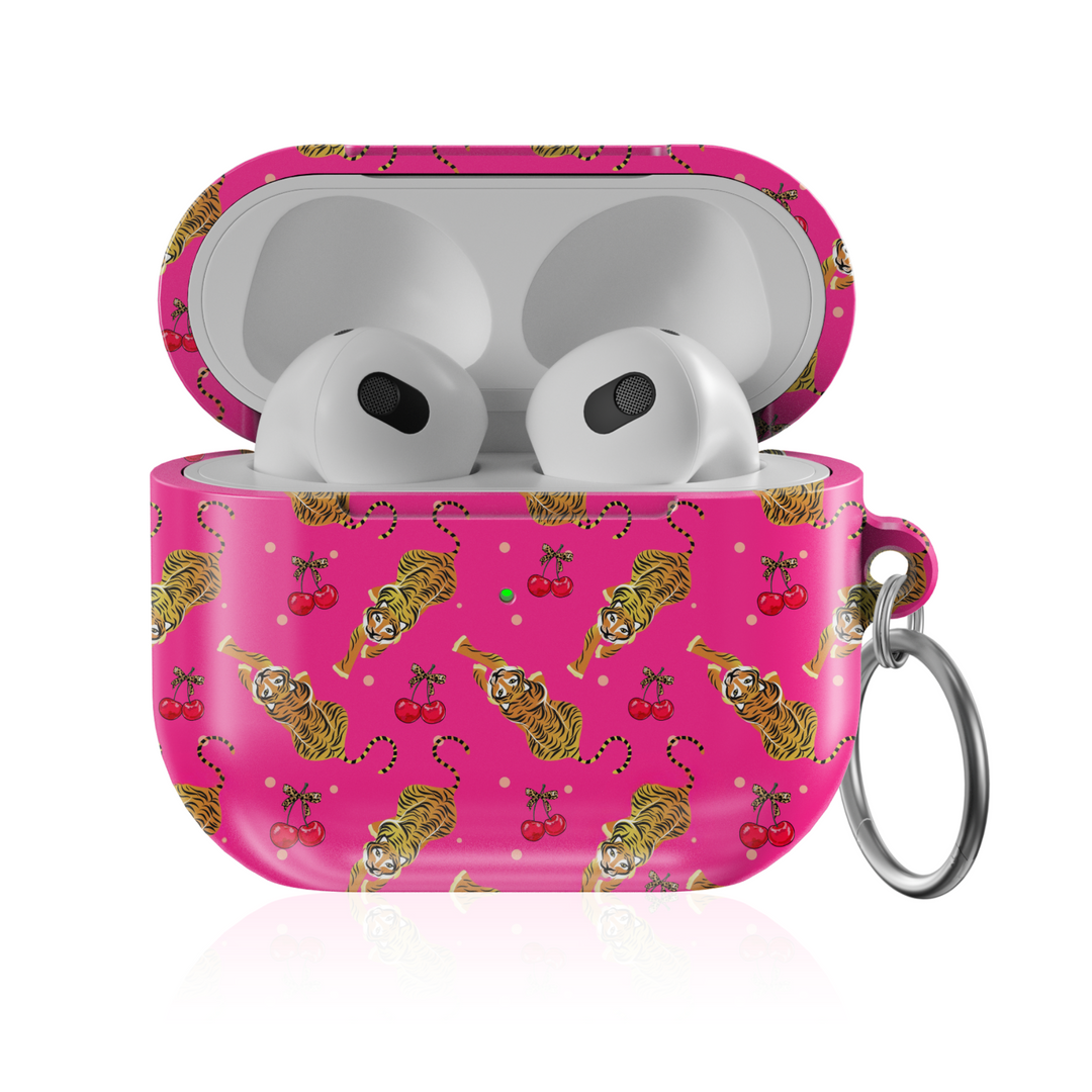 Pink AirPods case cover with playful tiger and cherry pattern, featuring a glossy finish and attached keychain ring. Compatible with AirPods Pro, 3, 2, and 1.