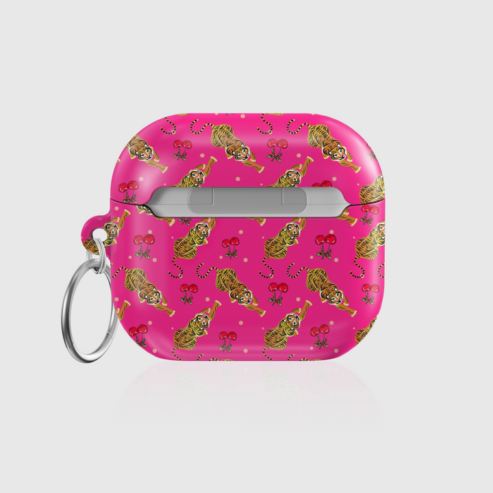 Pink AirPods case cover with playful tiger and cherry pattern, featuring a glossy finish and attached keychain ring. Compatible with AirPods Pro, 3, 2, and 1.