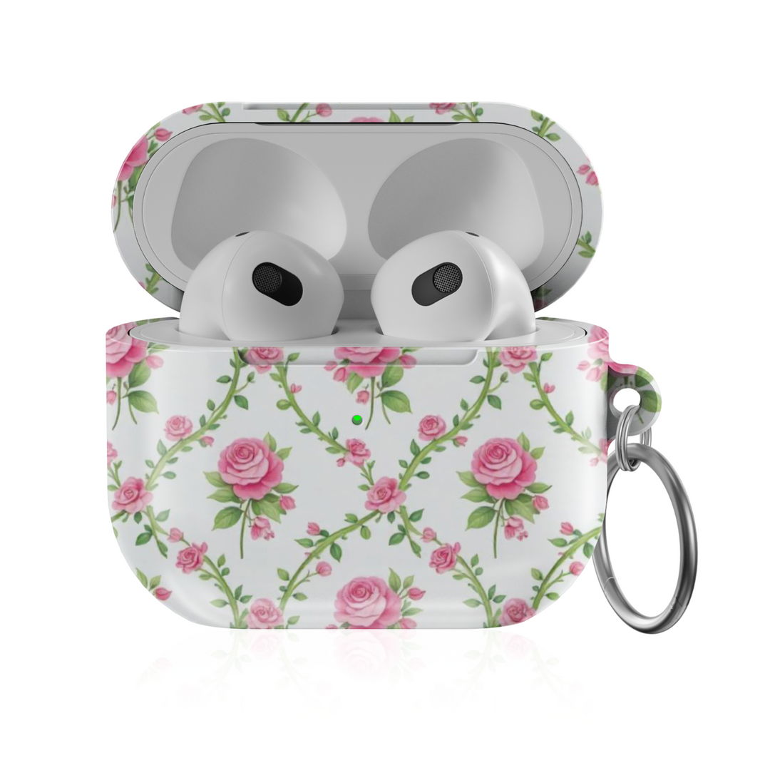 White AirPods case with delicate pink rose vine pattern and keychain ring—vintage floral accessory for stylish music lovers.