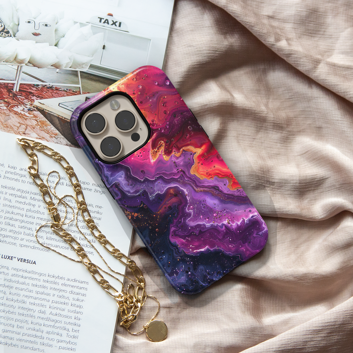 Purple swirl abstract iPhone case with golden accents and cosmic glow – stylish and protective cover for iPhone 16, 15, 14 Pro & Plus with MagSafe support.
