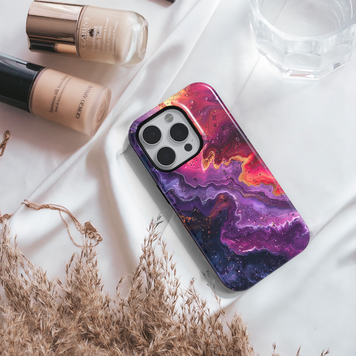 Purple swirl abstract iPhone case with golden accents and cosmic glow – stylish and protective cover for iPhone 16, 15, 14 Pro & Plus with MagSafe support.