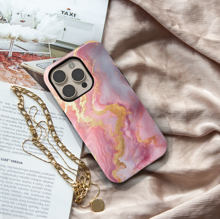Blush pink marble iPhone 16 MagSafe case with gold shimmer veins – elegant, feminine, and protective phone cover for a chic look.