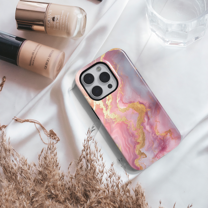 Blush pink marble iPhone 16 MagSafe case with gold shimmer veins – elegant, feminine, and protective phone cover for a chic look.