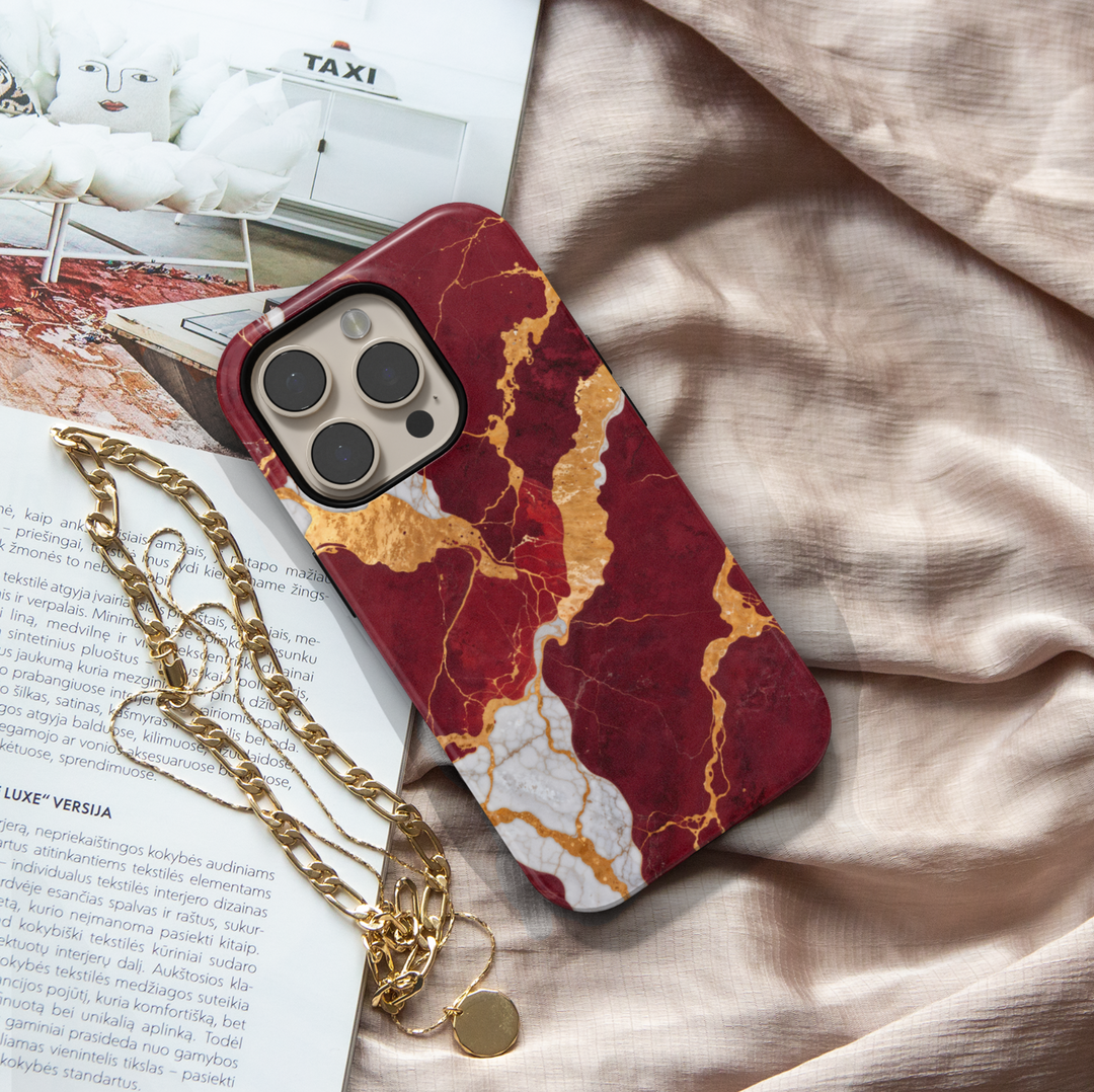 Burgundy marble phone case with gold and white crackle design – compatible with iPhone 16, 16 Pro Max, Galaxy S24 Ultra, MagSafe-ready tough case.