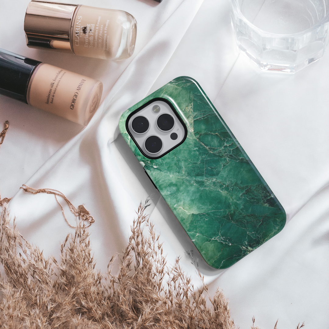 Emerald green marble iPhone 16 MagSafe case with natural stone texture and deep jade tones, elegant and protective phone cover.