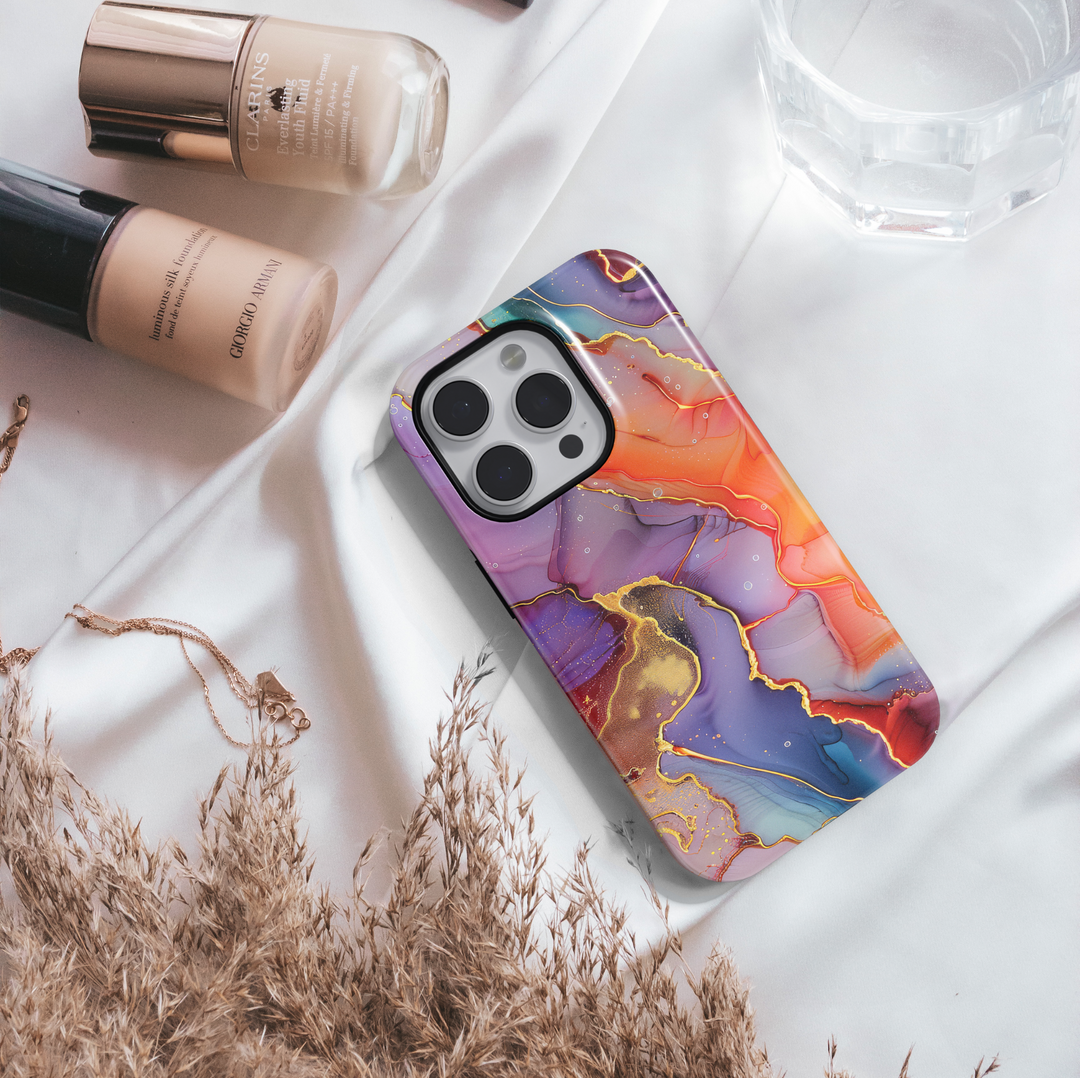 Bold abstract watercolor swirl phone case in orange, purple, teal, and gold – fits iPhone 16 Pro, Galaxy S24 Ultra, iPhone 15 Plus, MagSafe compatible.