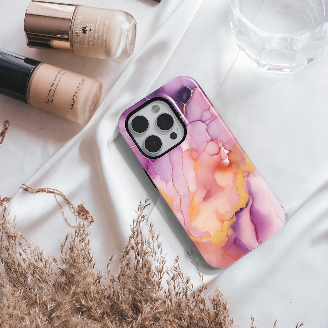 Vibrant pink, purple, and orange watercolor marble phone case – fits iPhone 16 Pro, 15 Plus, Galaxy S24 Ultra, MagSafe compatible.