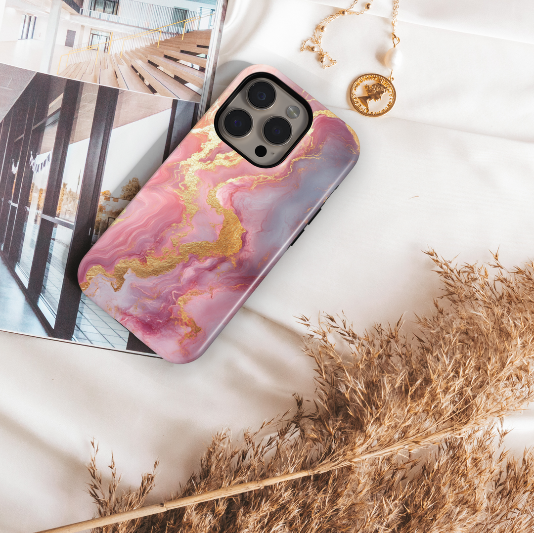 Blush pink marble iPhone 16 MagSafe case with gold shimmer veins – elegant, feminine, and protective phone cover for a chic look.