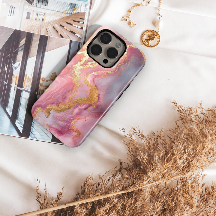 Blush pink marble iPhone 16 MagSafe case with gold shimmer veins – elegant, feminine, and protective phone cover for a chic look.