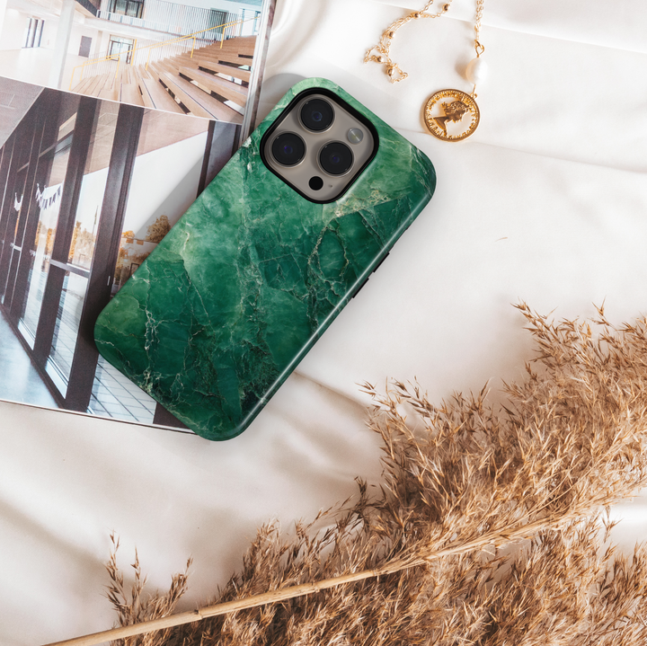 Emerald green marble iPhone 16 MagSafe case with natural stone texture and deep jade tones, elegant and protective phone cover.