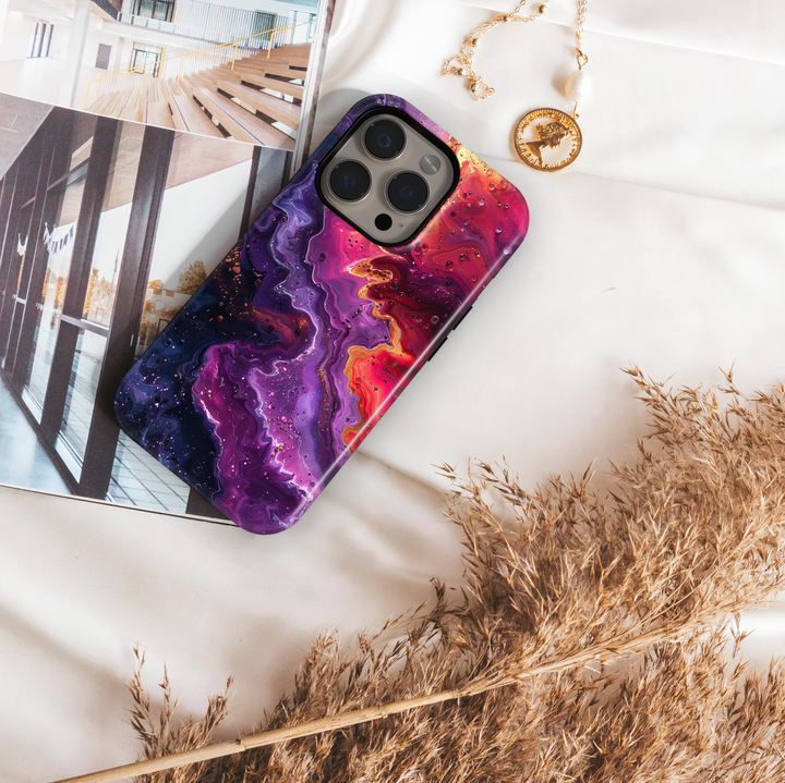 Purple swirl abstract iPhone case with golden accents and cosmic glow – stylish and protective cover for iPhone 16, 15, 14 Pro & Plus with MagSafe support.