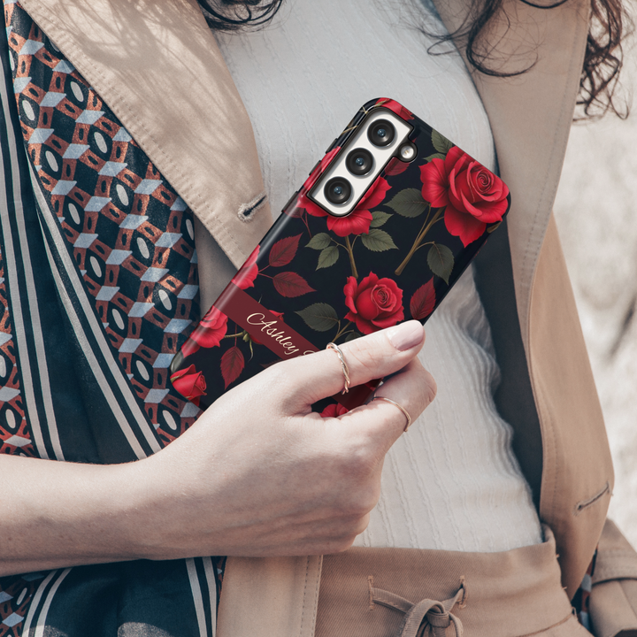 Elegant red rose floral phone case with dark background and personalized name strip