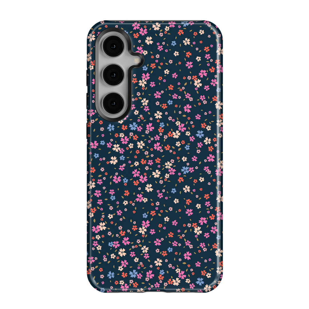 Galaxy phone case with tiny multicolored floral print on dark navy background – aesthetic garden-style design