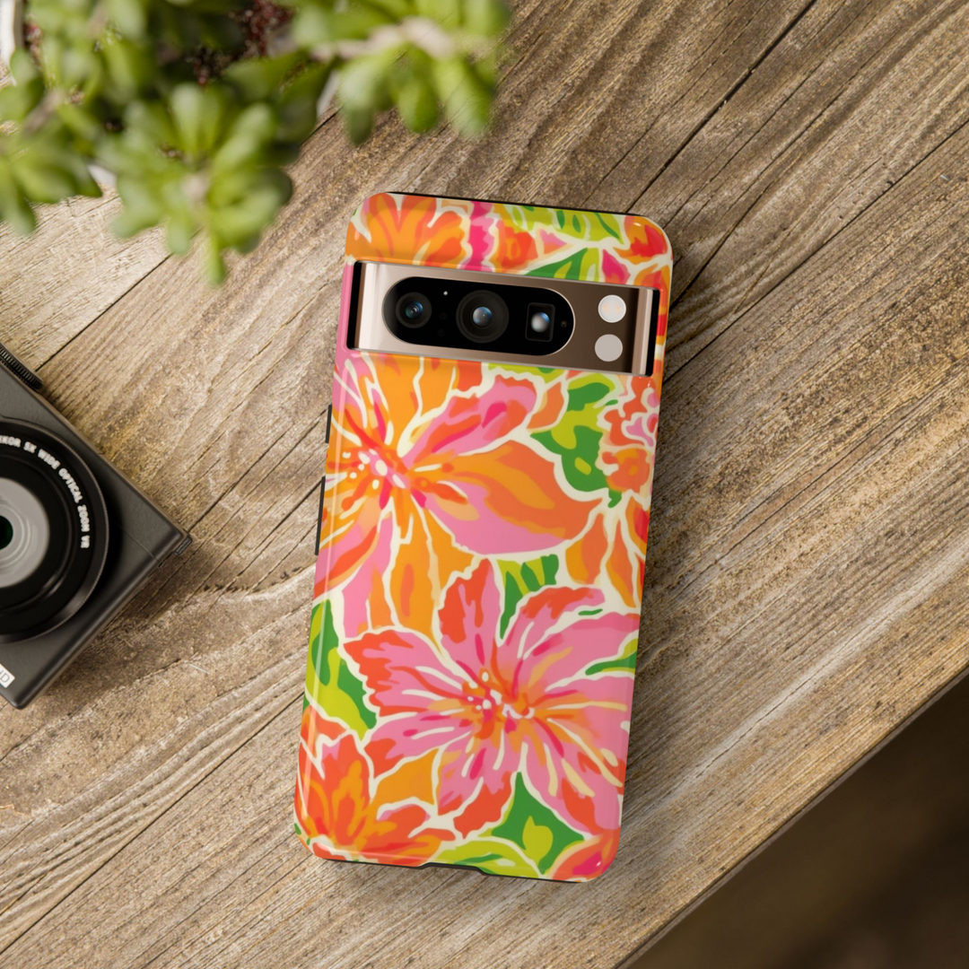 Bright tropical floral Google Pixel case with pink, orange, and green flowers – summer design