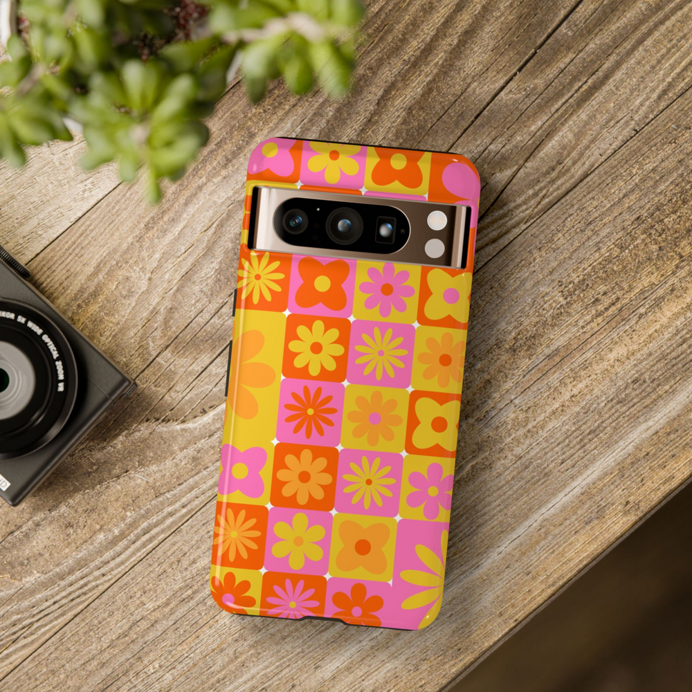 70s retro floral Google Pixel case with pink, orange, and yellow grid flower pattern – tough protective case for Pixel 8, 8 Pro, and 9 Pro XL
