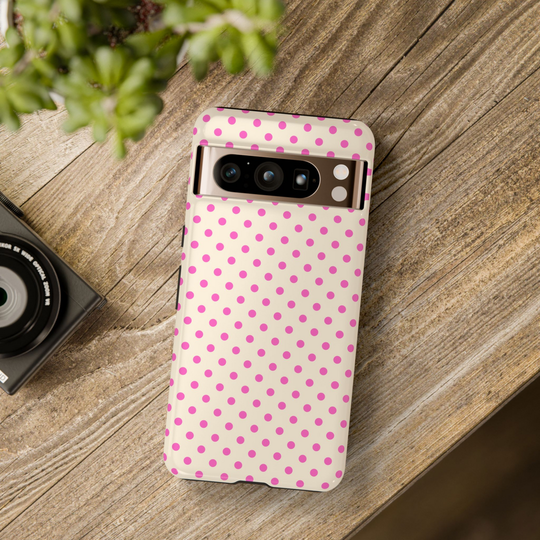 Girly Google Pixel case with pink polka dots on a cream background – retro cute design