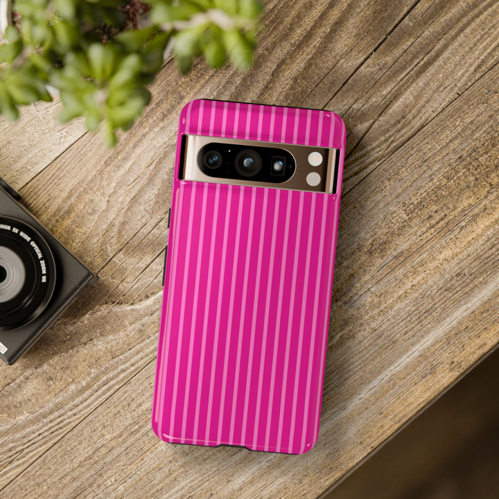 Google Pixel case with hot pink and bubblegum pink vertical stripes in a bold girly pattern