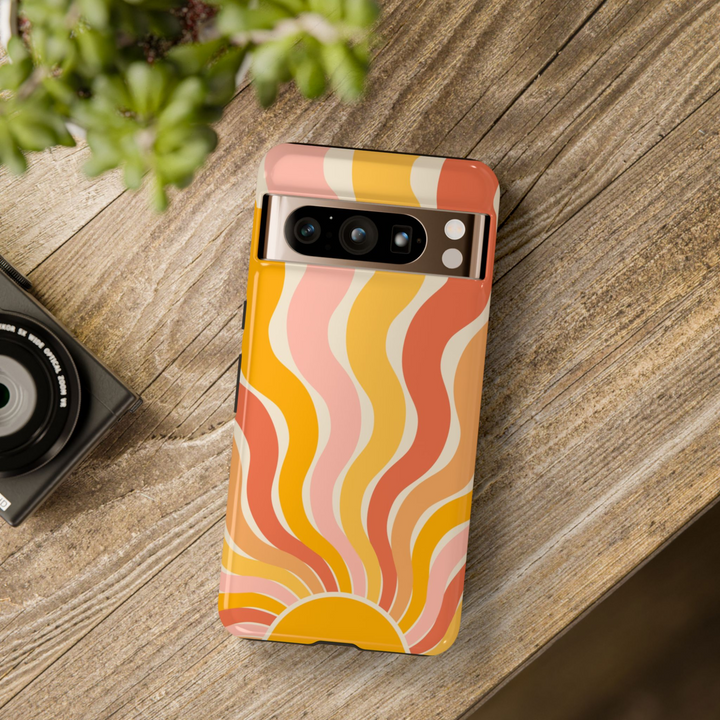 Bright retro sunrise phone case for Google Pixel featuring wavy sunray pattern in yellow, peach, and coral – durable and aesthetic summer design