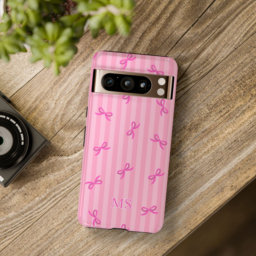 Google Pixel case with pink ribbon pattern and vertical stripes, personalized with white “MS” initials for breast cancer awareness