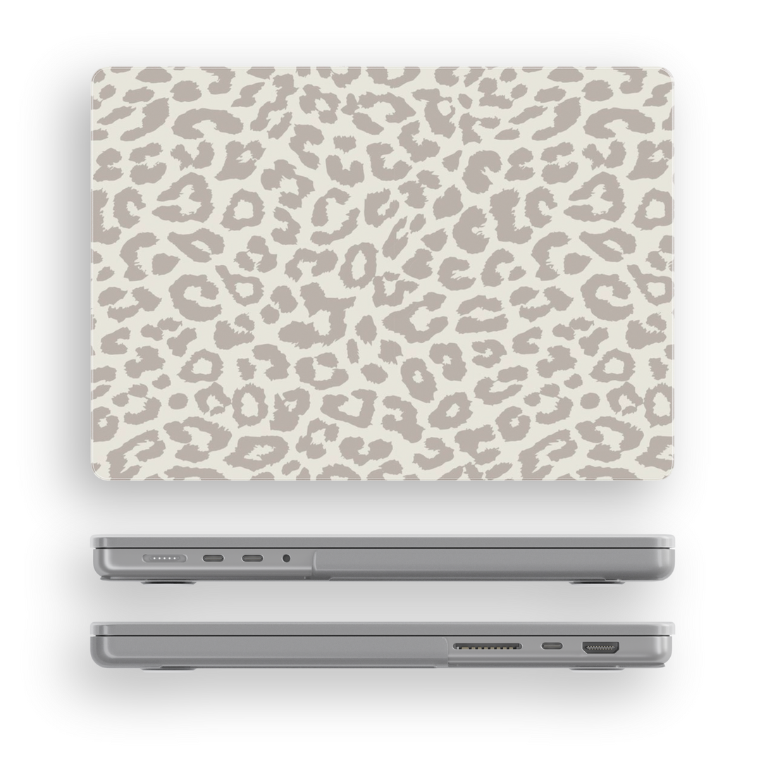 Beige cheetah print MacBook case with minimalist animal pattern, aesthetic laptop skin compatible with MacBook Pro and Air models.
