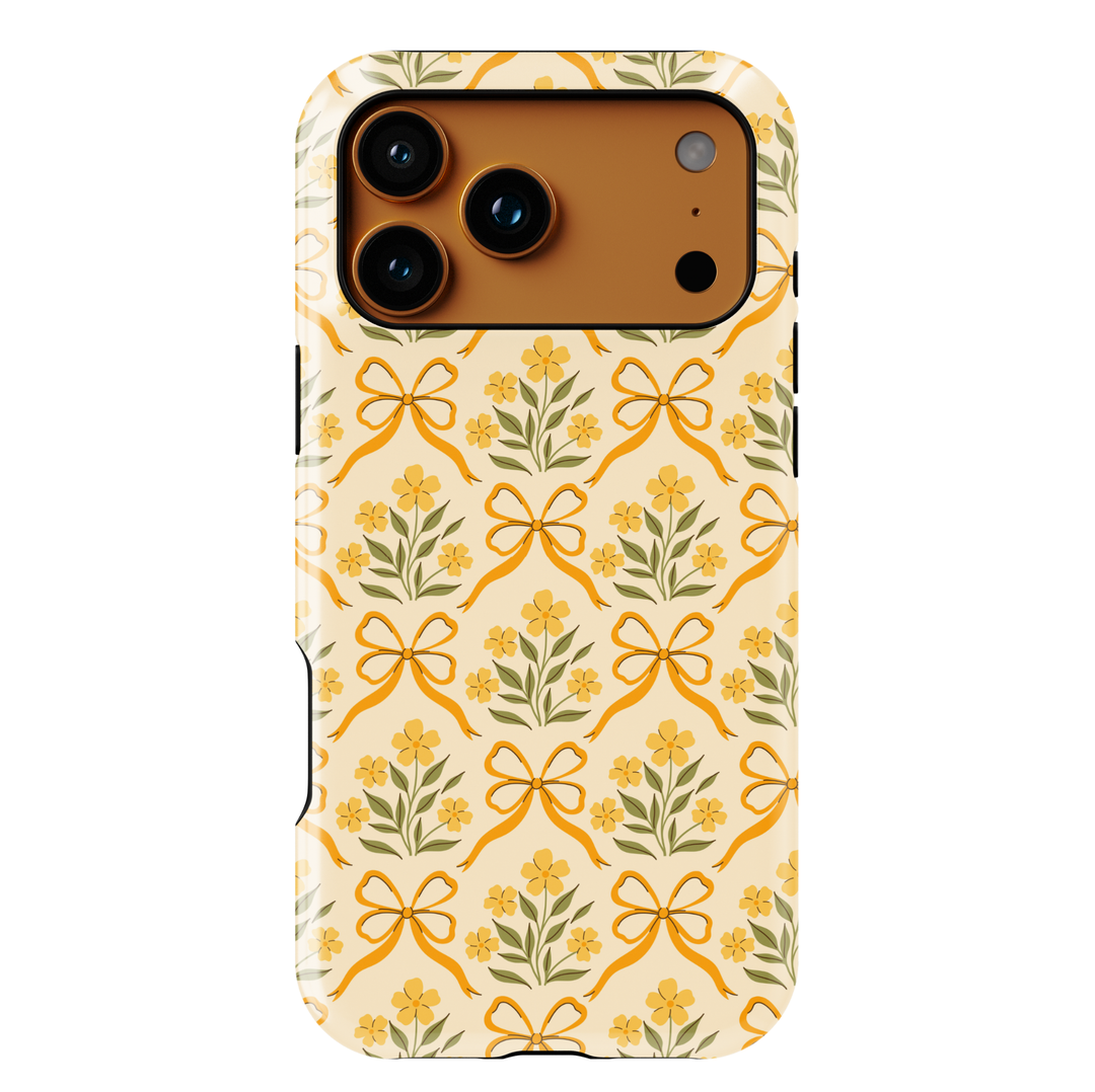 Yellow phone case with floral bow pattern, coquette vintage aesthetic design for iPhone and Samsung