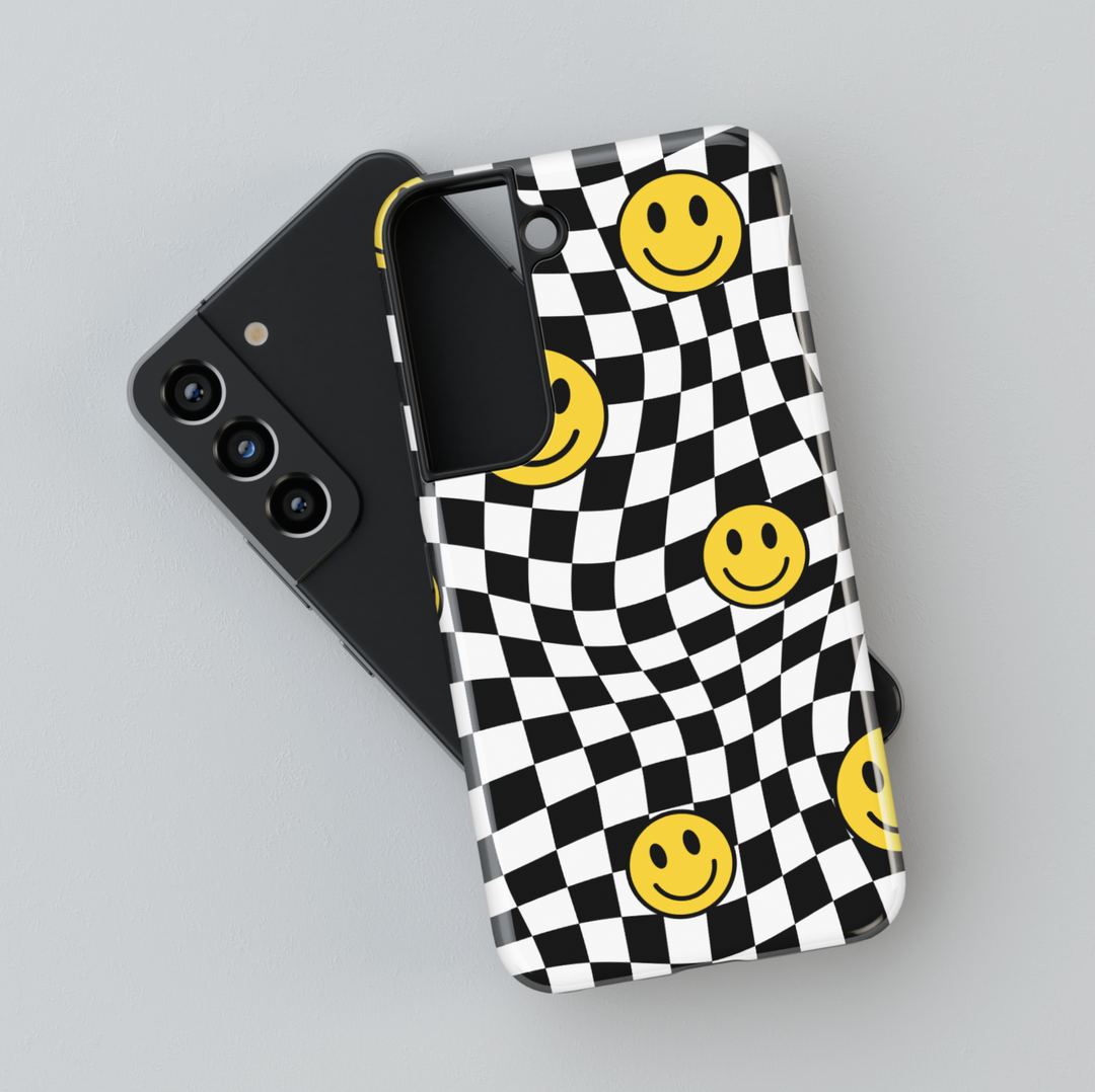 Samsung Galaxy case with black and white wavy checkerboard and yellow smiley face pattern – fun retro design for Galaxy S24 Ultra, S25, S24 FE.