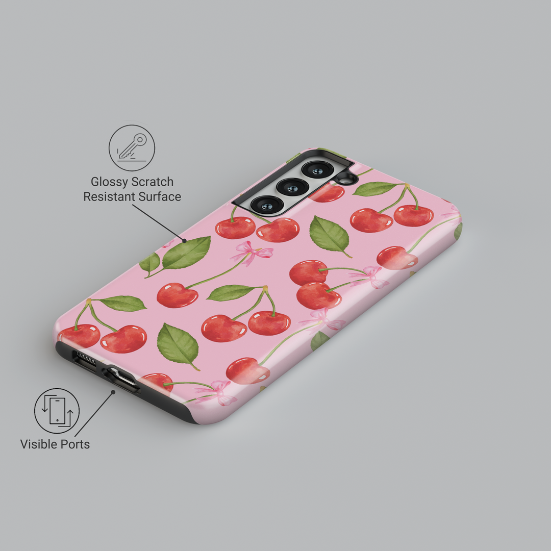 Cute Samsung Galaxy case with pink background, red cherry and white polka dot pattern – fits Galaxy S24 Ultra, S25, S24 FE. Girly cherry design with leaves and bow accents.