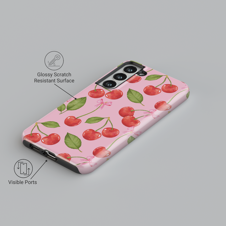 Cute Samsung Galaxy case with pink background, red cherry and white polka dot pattern – fits Galaxy S24 Ultra, S25, S24 FE. Girly cherry design with leaves and bow accents.