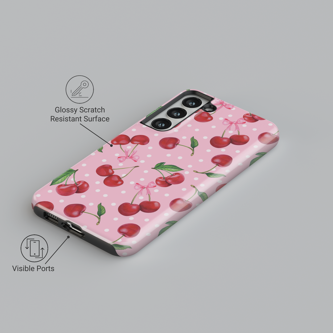 Cute Samsung Galaxy case with pink background, red cherry and white polka dot pattern – fits Galaxy S24 Ultra, S25, S24 FE. Girly cherry design with leaves and bow accents.