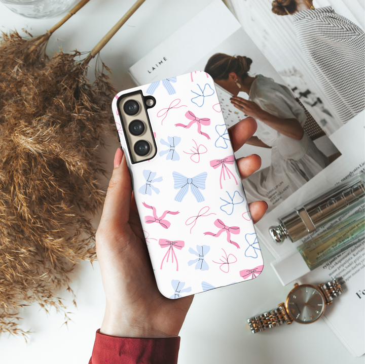 Samsung Galaxy phone case with pink and blue girly bows on a white background – cute coquette aesthetic tough case for girls