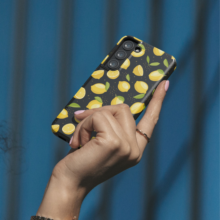Yellow lemon Samsung Galaxy S24 Ultra case for women – fruity citrus phone case for Galaxy S25, S24 FE, S23 Ultra with black background and green leaves.