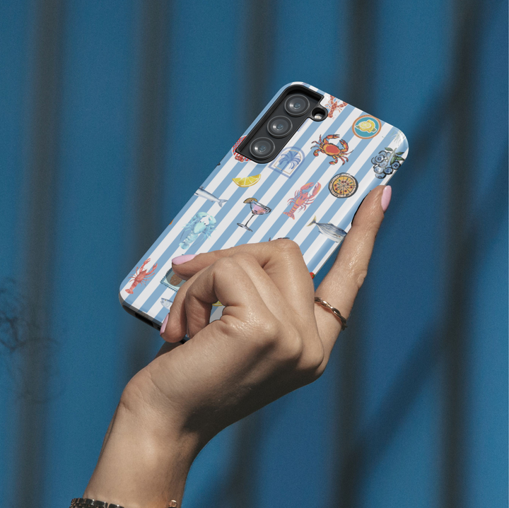 Samsung Galaxy phone case with blue and white stripes and colorful seafood, lemon, crab, and cocktail illustrations – coastal aesthetic tough case